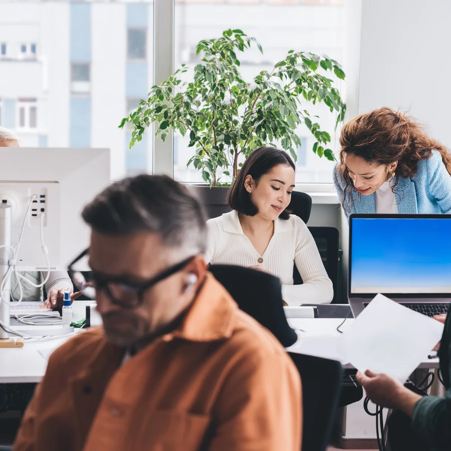 corporate-team-collaborating-in-modern-bright-offi-2026-03-24-15-30-15-utc