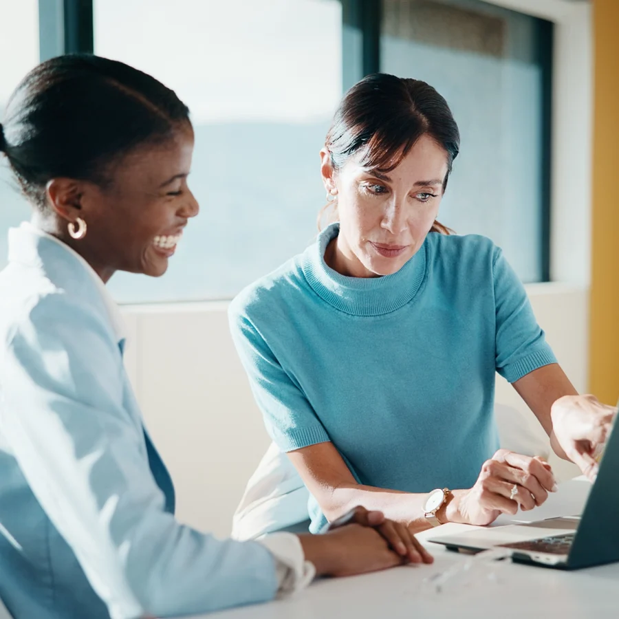 two-professional-women-collaborating-over-a-laptop-2026-06-16-18-48-35-utc